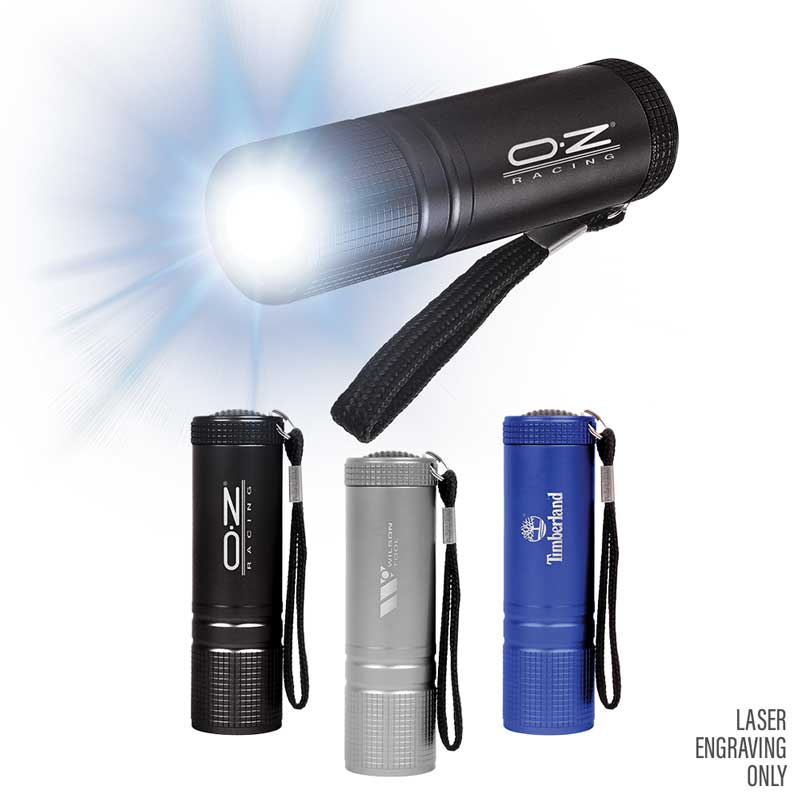 Antora COB Flashlight - This compact, aluminum body flashlight provides a powerful punch. Features newer COB (Chip on Board) LED technology, which results in a brighter light from a smaller source. Uses 3 AAA batteries (Included). Comes with strap.
